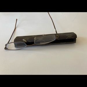 Reading glasses, strength 2, with case, good condition.